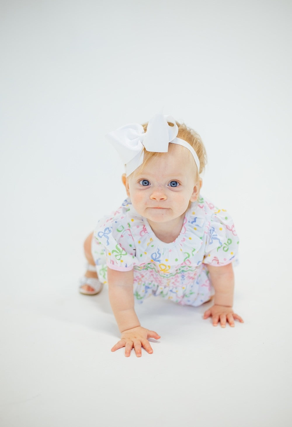 Shop Teeta Girls Pastel Party Bows Print Smocked Bubble - Puffy Sleeves by Shop Teeta