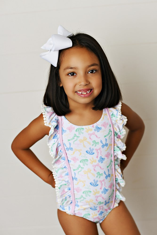Swoon Baby Girls Pastel Bows Ruffle Swimsuit - Pink Bow on Back