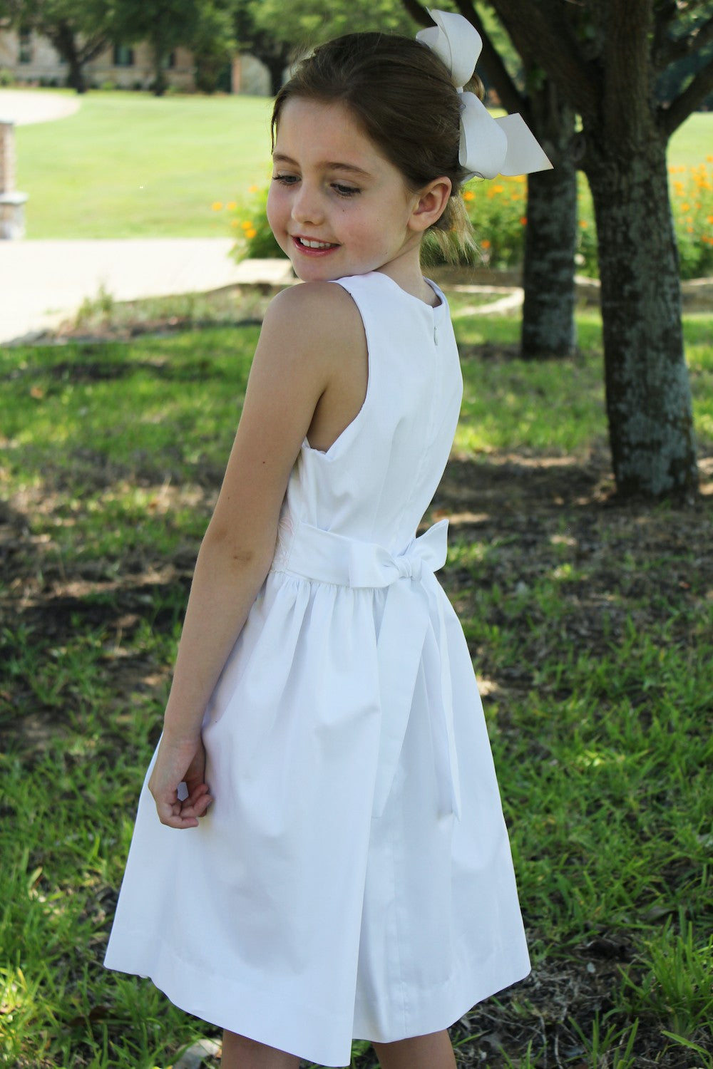 Susanne Lively Girls Sleeveless White Pique Dress with Embroidered Eyelet Waist