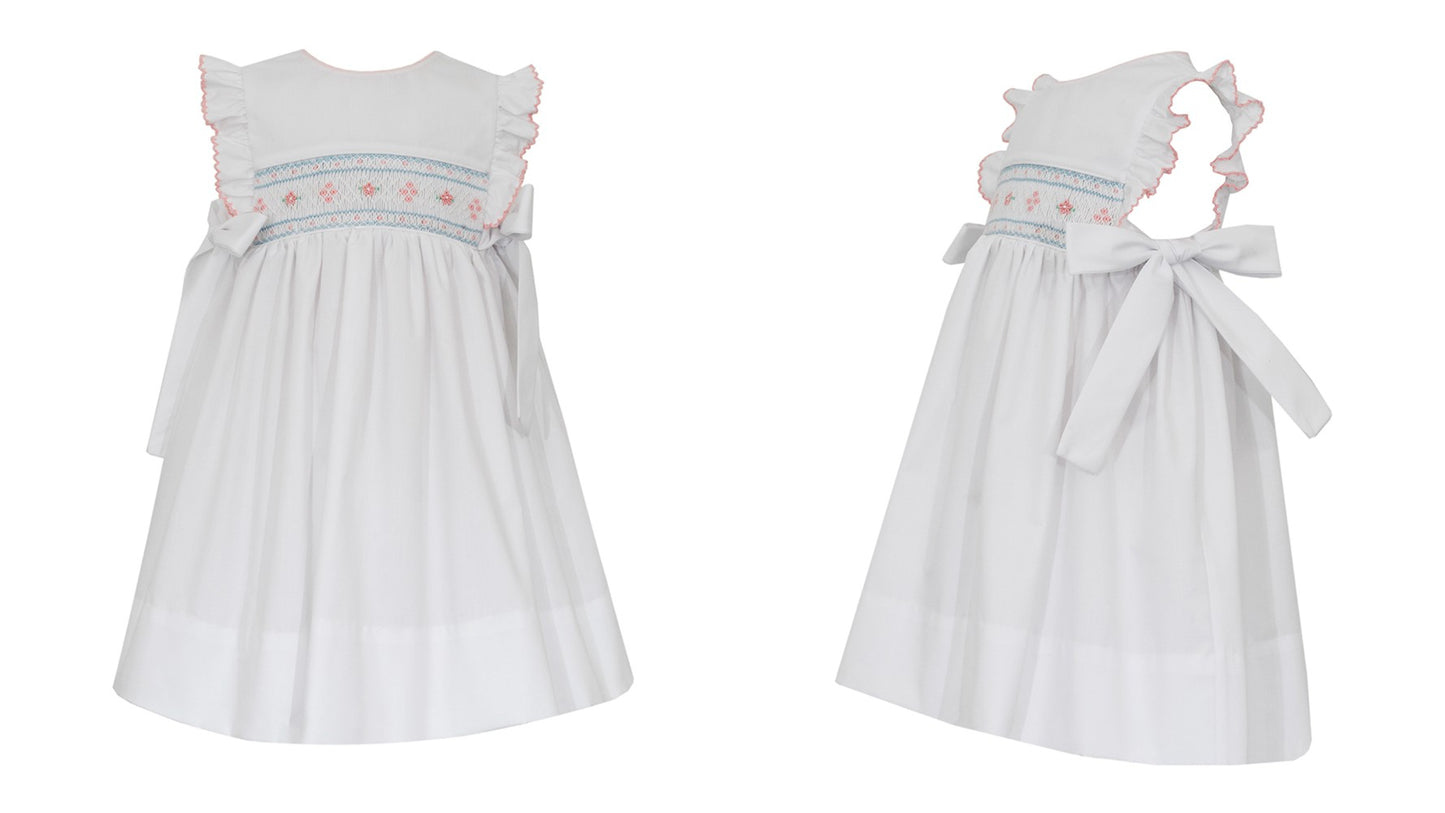 Petit Bebe Girls White Poplin Sleeveless Smocked Dress - Bows at Sides by Petit Bebe