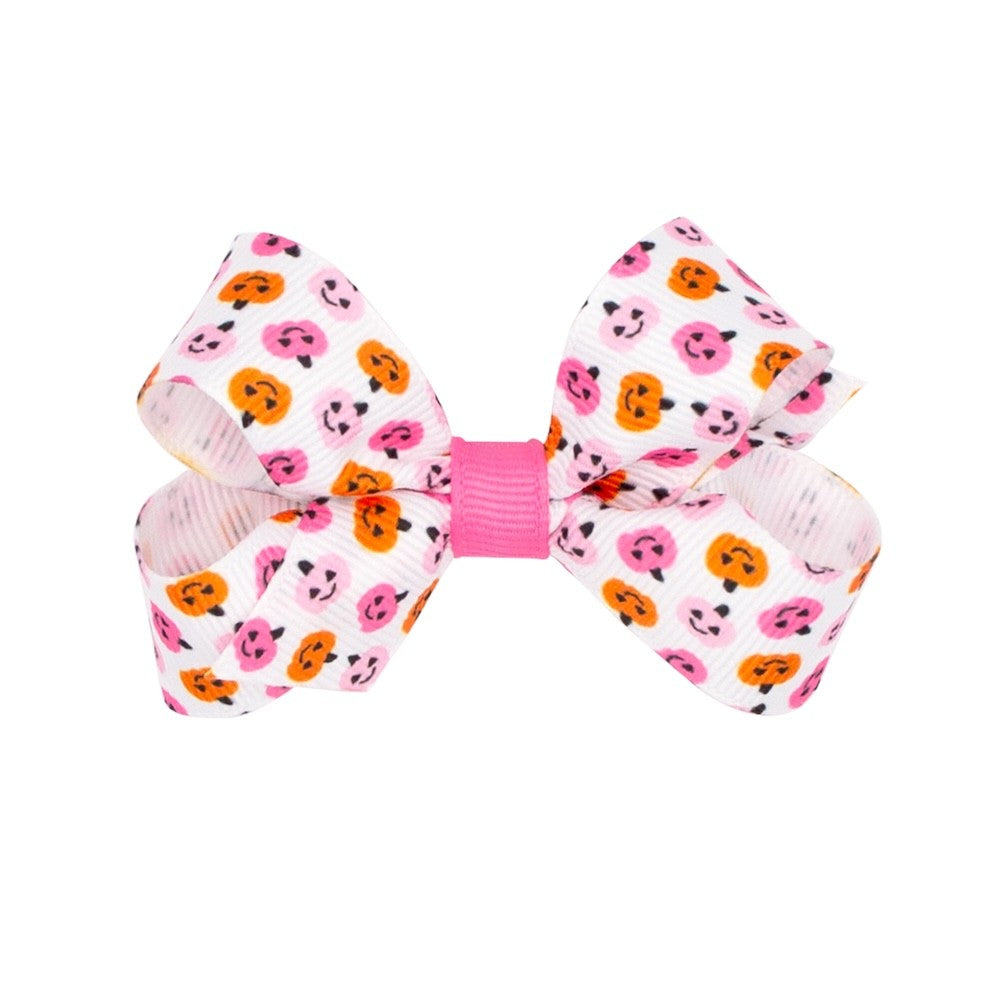 Wee Ones Girls Hair Bow on Clip - Pink & Orange Halloween Jack O'Lanterns Print