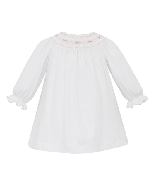 Petit Bebe Knits Girls White Smocked Bishop Dress - Long Sleeves by Petit Bebe