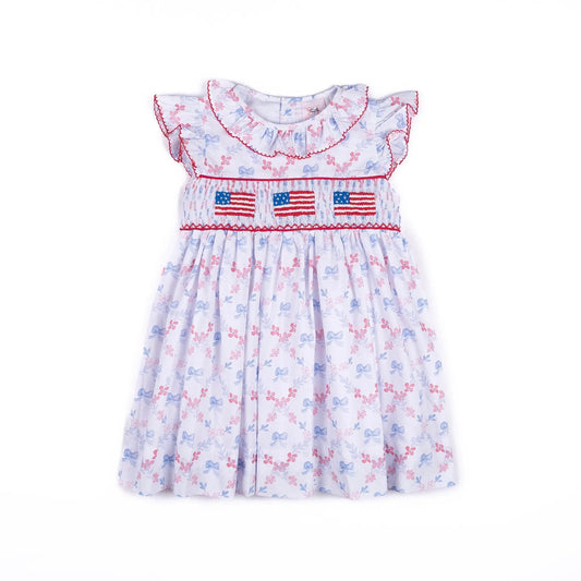 Shop Teeta Girls Ally Dress - Patriotic Bows Print - Smocked USA Flags by Shop Teeta