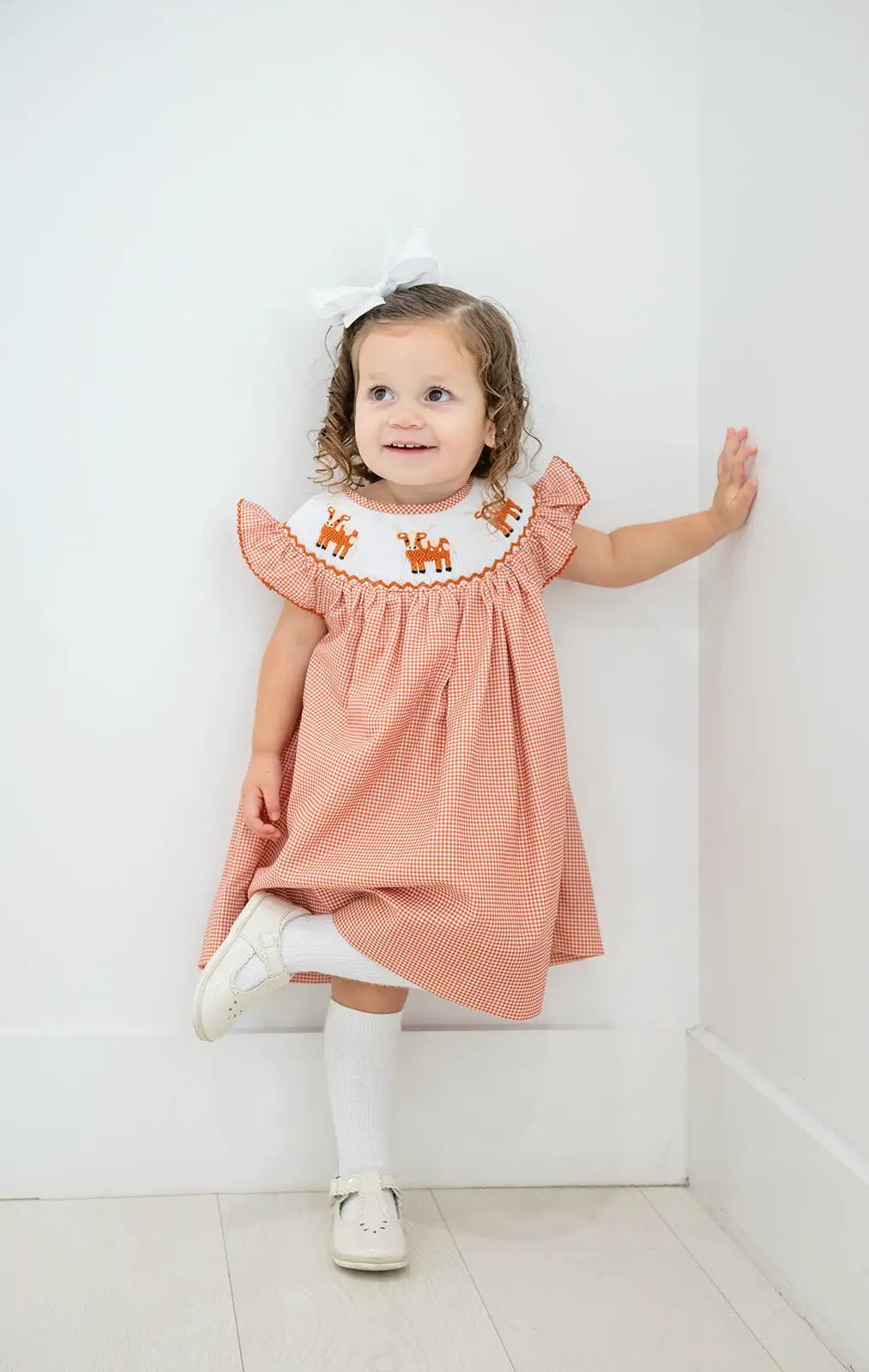 Shop Teeta Girls Kate Dress - Orange Gingham Smocked Texas Longhorns