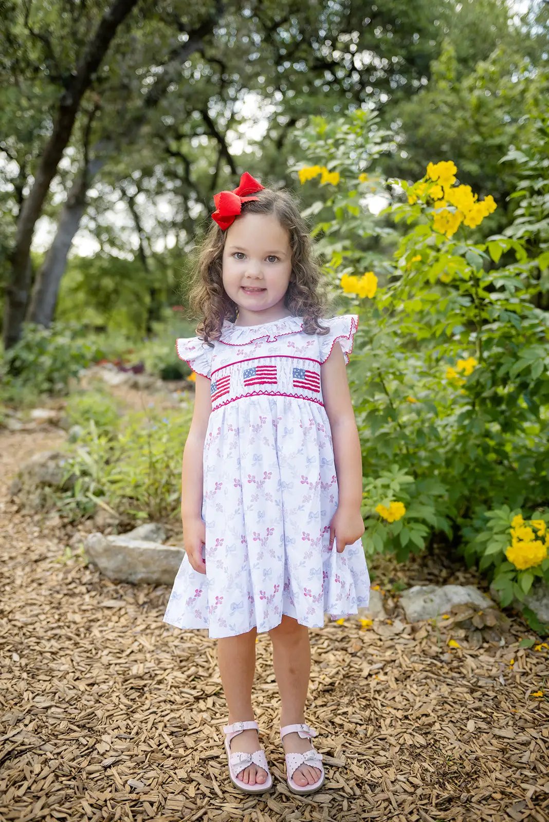 Shop Teeta Girls Ally Dress - Patriotic Bows Print - Smocked USA Flags by Shop Teeta