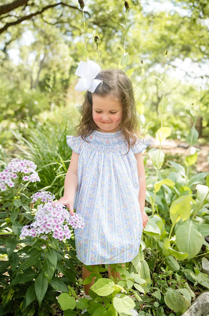 Shop Teeta Girls Smocked Dress - Blue Floral and Pink Bows Print by Shop Teeta