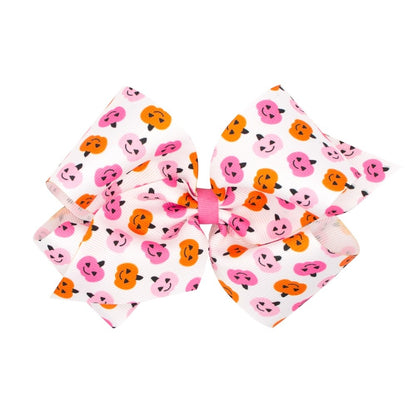 Wee Ones Girls Hair Bow on Clip - Pink & Orange Halloween Jack O'Lanterns Print