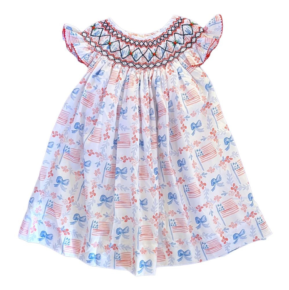 Shop Teeta Girls Smocked Annie Dress - Patriotic Flags & Bows Print