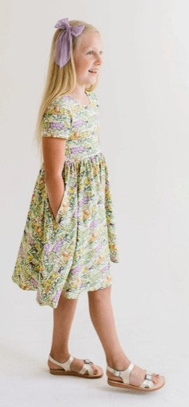 Ollie Jay Girls Classic Twirl Dress in Mardi Gras Print
