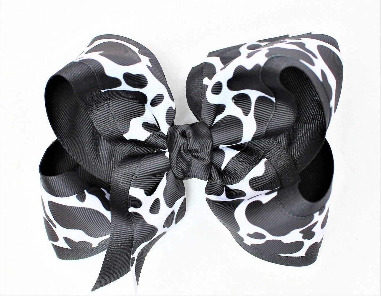 Beyond Creations Girls Grosgrain Layered Double Knot Bow on Clip - Black & White Cow Print