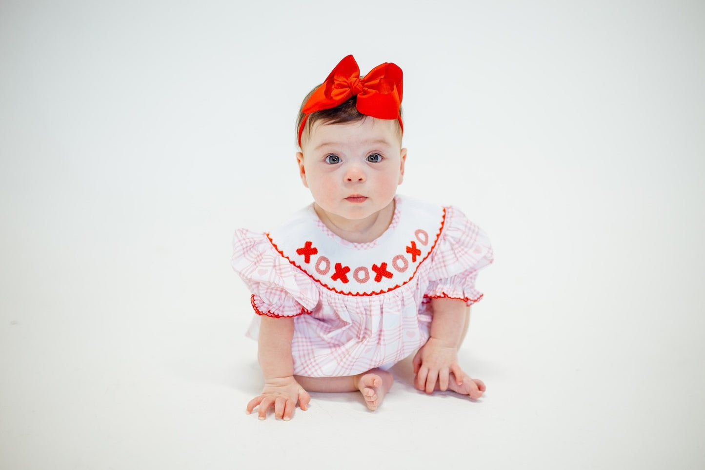 Shop Teeta Baby Girls Pink Smocked XOXO Bubble
