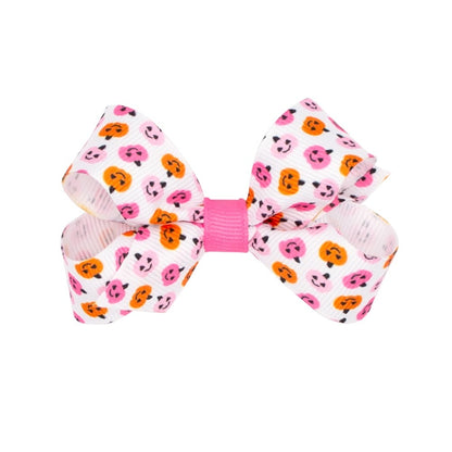 Wee Ones Girls Hair Bow on Clip - Pink & Orange Halloween Jack O'Lanterns Print